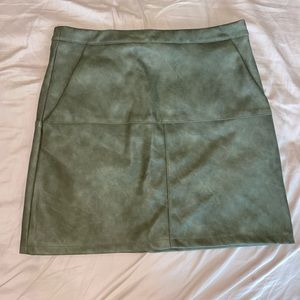 Green mini skirt!